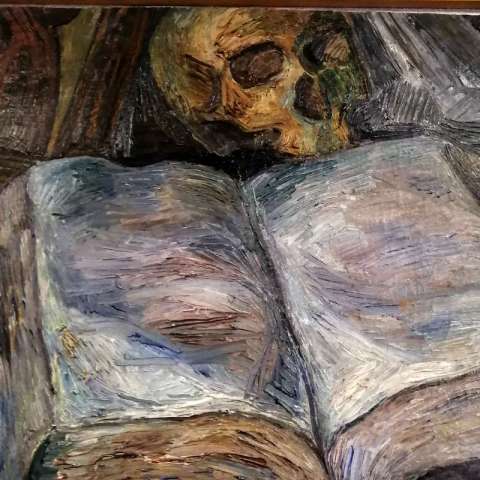 Skull and book. Fragment of a painting by Dmitry Krasnopevtsev